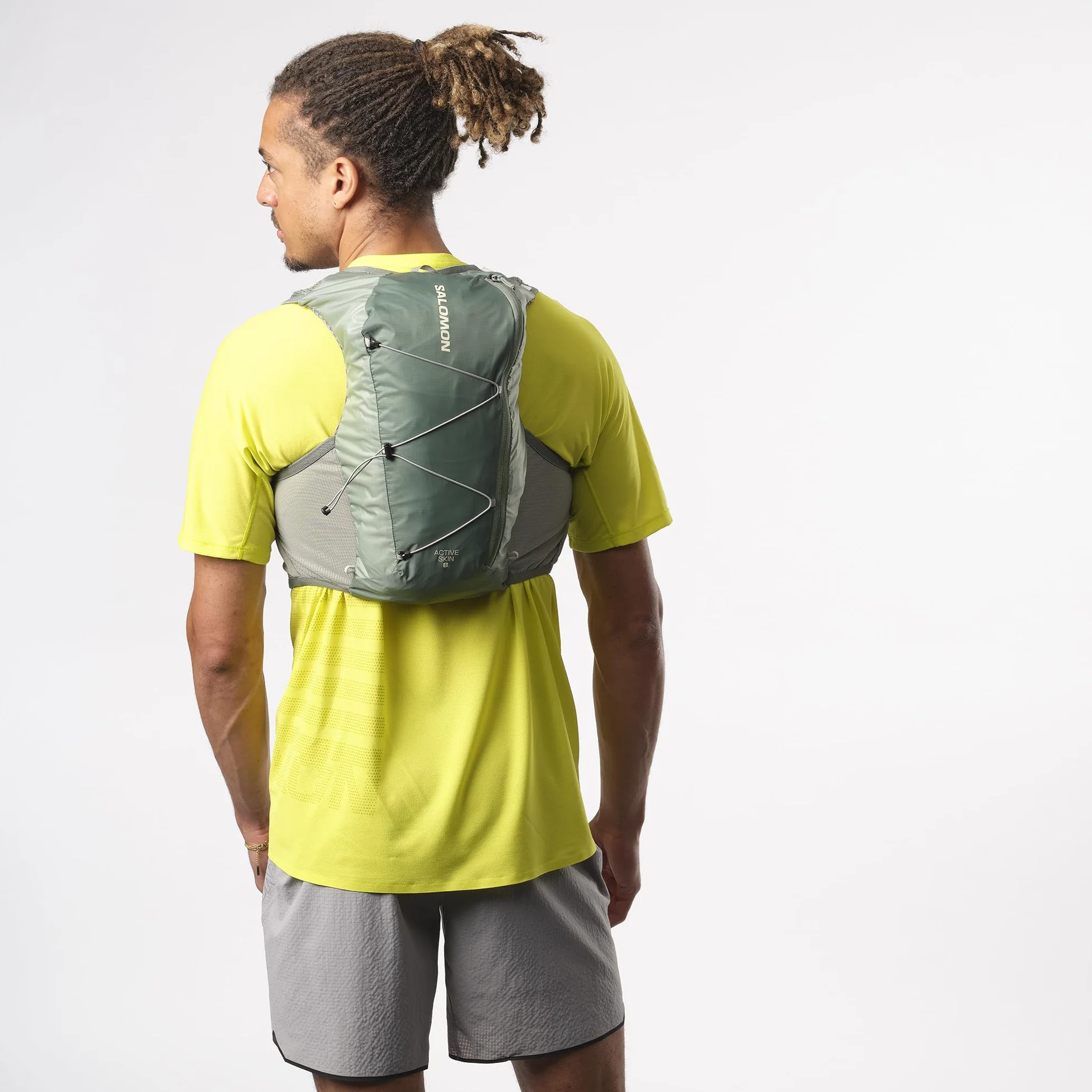 Salomon Active Skin 8 Unisex kamizelka nawadniająca do biegania szlak turystyczny z butelkami w zestawie, łatwe nawodnienie, precyzyjne dopasowanie 8 l i zoptymalizowane przechowywanie, zielona, M