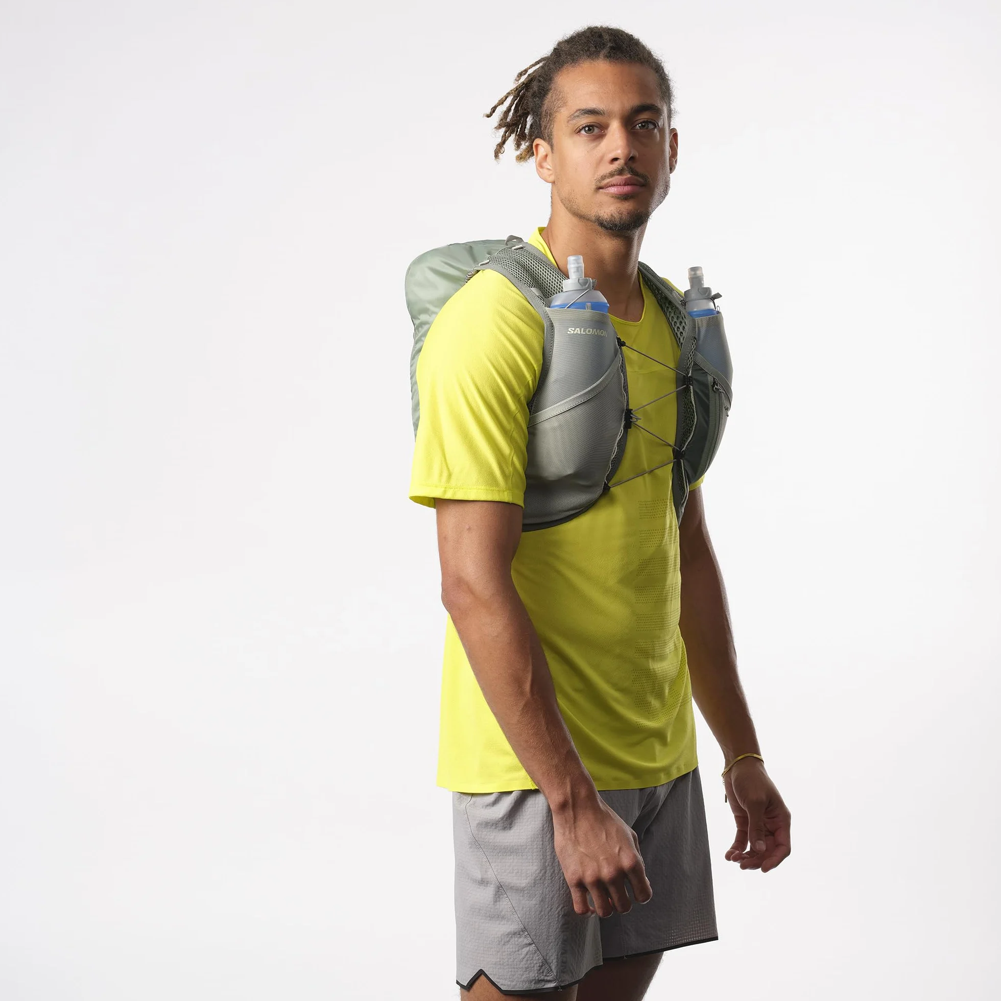 Salomon Active Skin 8 Unisex kamizelka nawadniająca do biegania szlak turystyczny z butelkami w zestawie, łatwe nawodnienie, precyzyjne dopasowanie 8 l i zoptymalizowane przechowywanie, zielona, M