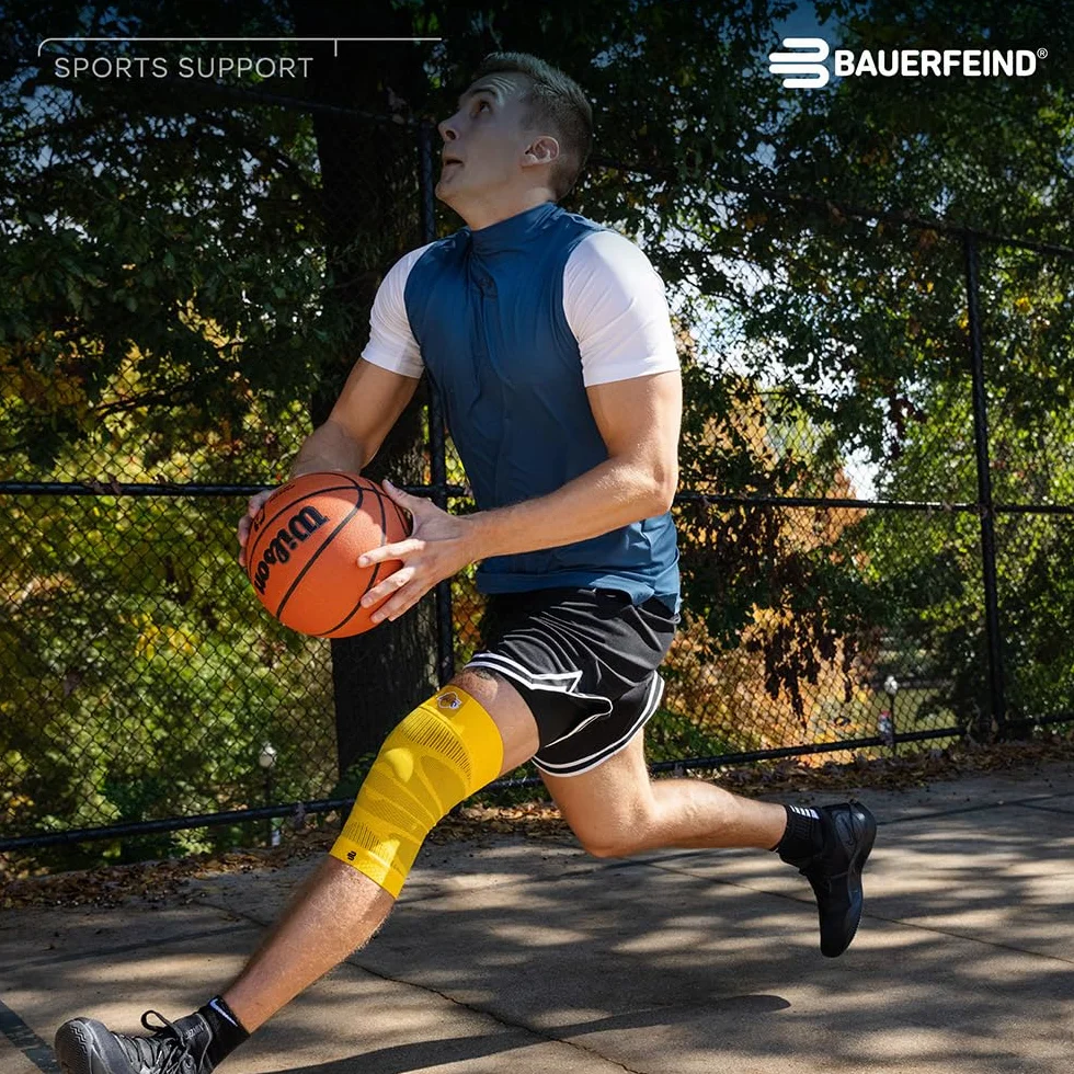 BAUERFEIND Opaska na kolano „Sports Compression Knee Support NBA“, 1 unisexowa opaska na kolano do sportów piłkarskich, opaska na kolano do koszykówki z logo zespołu